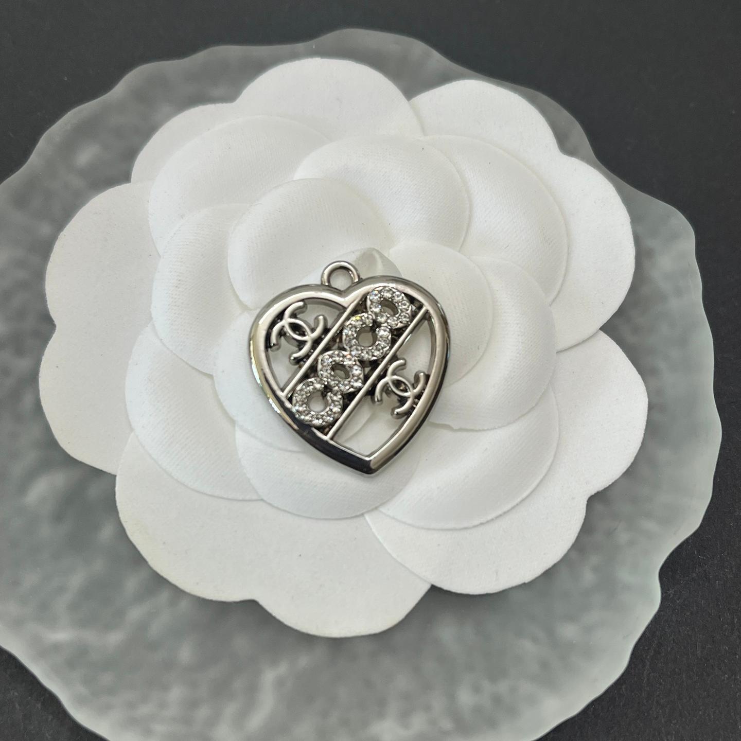 CC with lettered heart shape in the center 25MM*23MM
